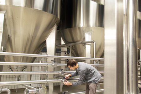 Man Working In Brewery