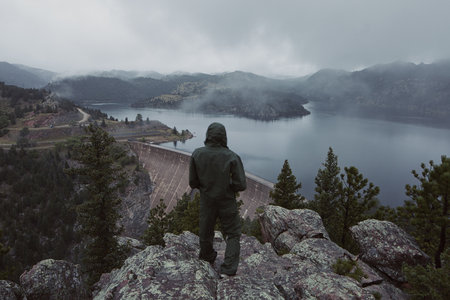 Man Overlooking The Gross Dam In Colorado, Usa