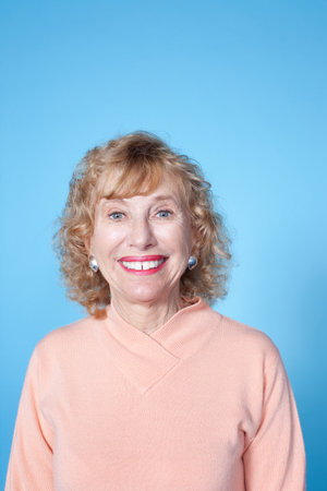 Senior Woman Looking At Camera, Studio Shotの写真素材