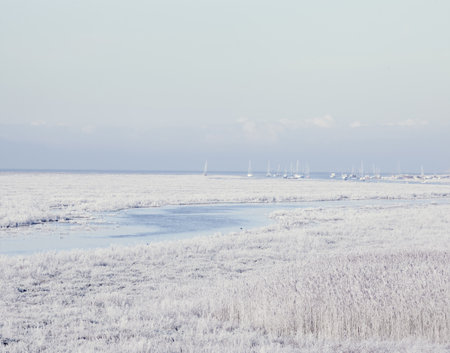 Frosted Coastline And Distant Yachts, Heswall, Wirral, England, Uk