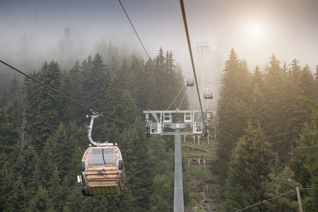 View Of Mist And Cable Cars, Blatten, Valais, Switzerland