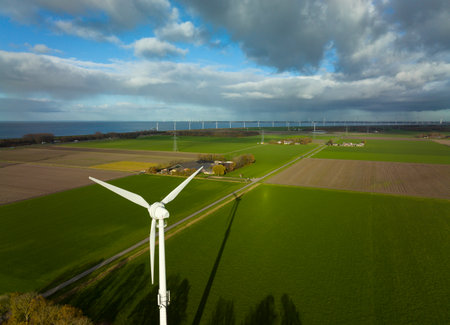 Wind turbines in green fieldsの写真素材
