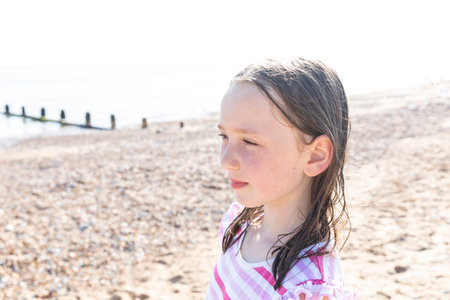 Girl (4-5) on beachの写真素材