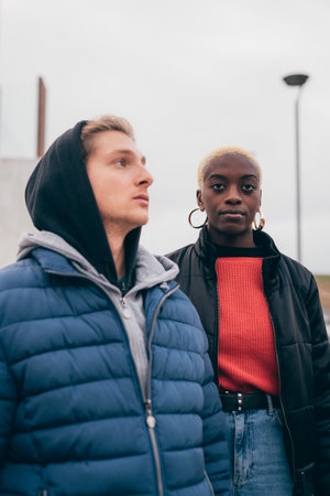 Italy, Couple standing in cityの写真素材