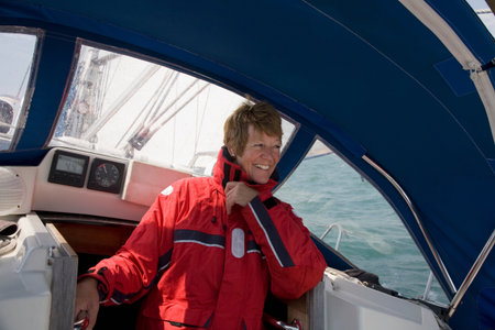 Woman sheltering on yacht