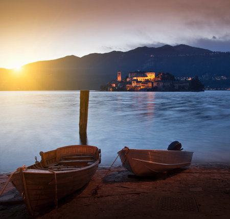 Boats on urban harbor wallの写真素材