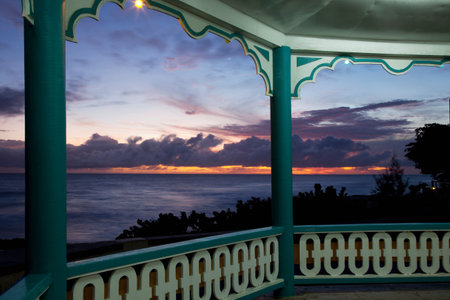 Sunset viewed from ornate gazeboの写真素材