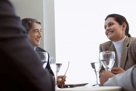 Business people having lunch togetherの写真素材