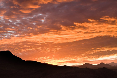 Silhouette of mountains and skyの写真素材