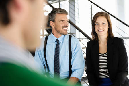 Business people standing in office