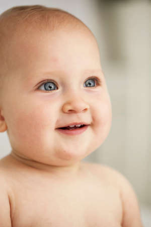 Close up of baby girls smiling faceの写真素材