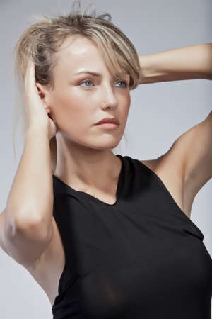Woman holding her headの写真素材