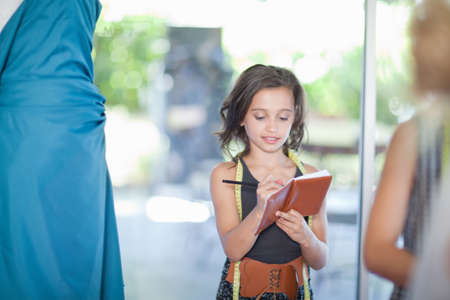 Girl playing fashion designerの写真素材