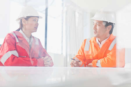 Business people talking at desk
