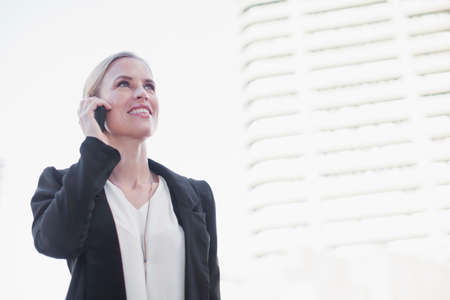 Businesswoman talking on cell phoneの写真素材