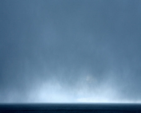 Snowstorm rolling over still bay