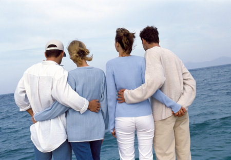 Two couples at the seasideの写真素材