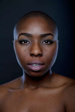 Portrait of young woman with shaved headの写真素材