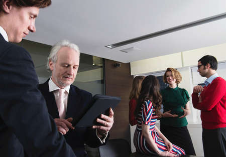 Business executives in meeting room