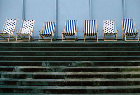 Deckchairs in a rowの写真素材