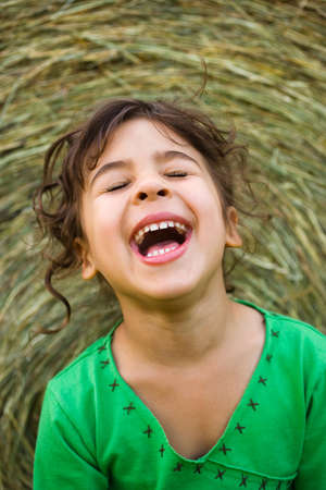 Portrait of a girl laughingの写真素材