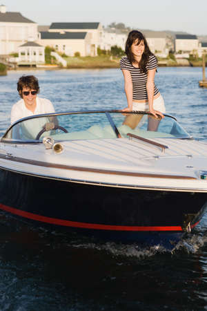 Teenagers on boatの写真素材