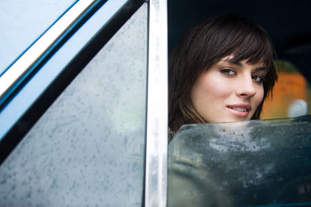 Young woman in car