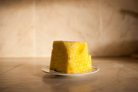 Slice of fresh pineapple on plateの写真素材