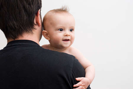 Father holding baby son