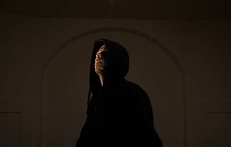 Young man wearing hooded top