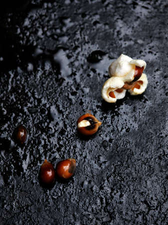Making popcorn in iron skillet