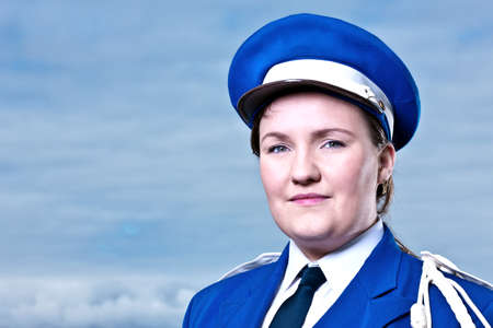 Portrait of young woman wearing marching band uniformの写真素材