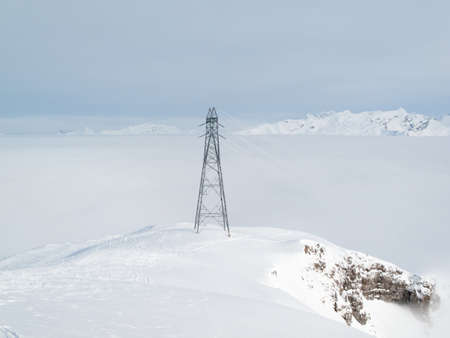 Electricity pylon on mountain,