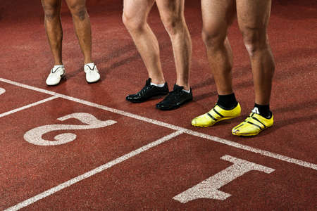 Athletes preparing to race on sportstrack, low sectionの写真素材