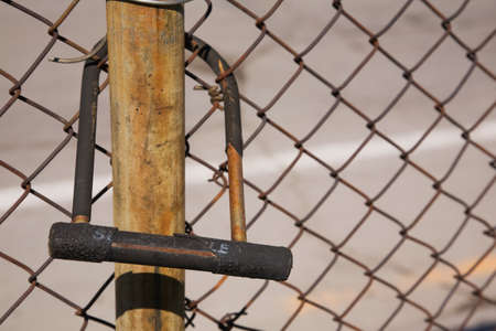 D lock and wire mesh fence