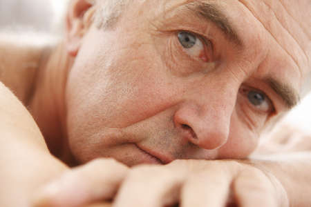 Senior man looking at cameraの写真素材