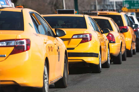 Line of yellow cabs, New York City, USA