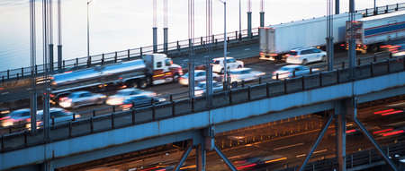 Close-up of busy traffic crossing bridge