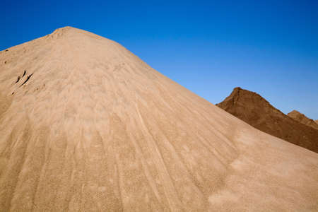 Mound of sand in commerical sand pit