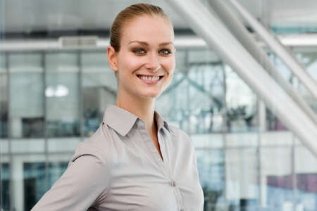 Portrait of young businesswoman, smilingの写真素材