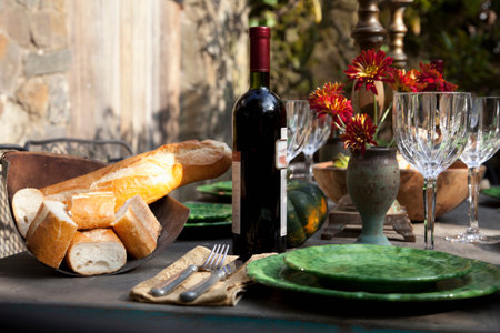 Bread and wine at set table