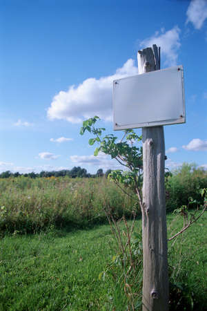 Blank sign in a fieldの写真素材