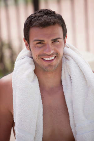 Man wearing towel outdoorsの写真素材