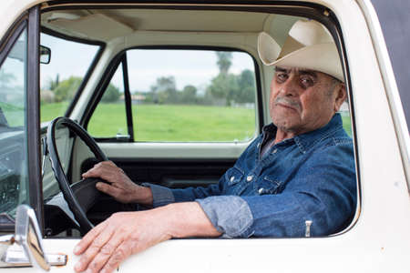 Farmer driving truck
