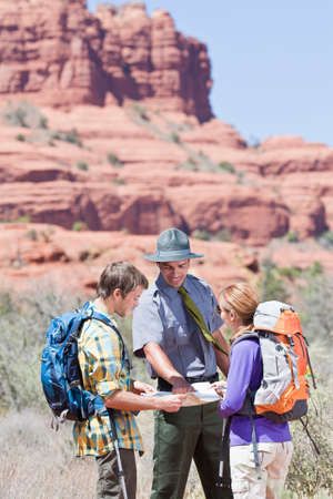 Hikers talking to park ranger