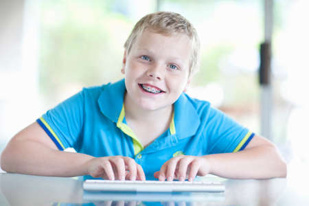 Boy using digital tablet