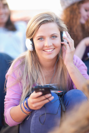 Young woman wearing headphonesの写真素材