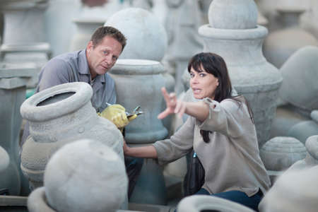 Dealing with sales in pottery factoryの写真素材