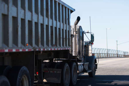 Construction truck on highwayの写真素材