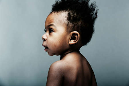 Portrait of baby boy looking awayの写真素材